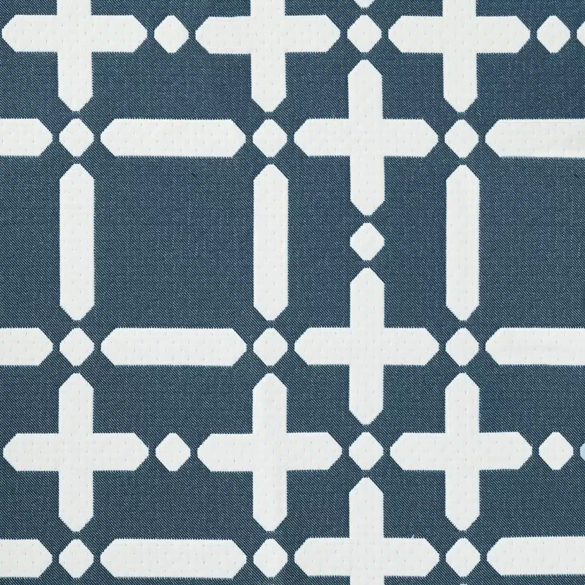 Geometric pattern with interlocking white crosses on a dark background, creating a symmetric, repeating design that resembles a modern fabric or tile.