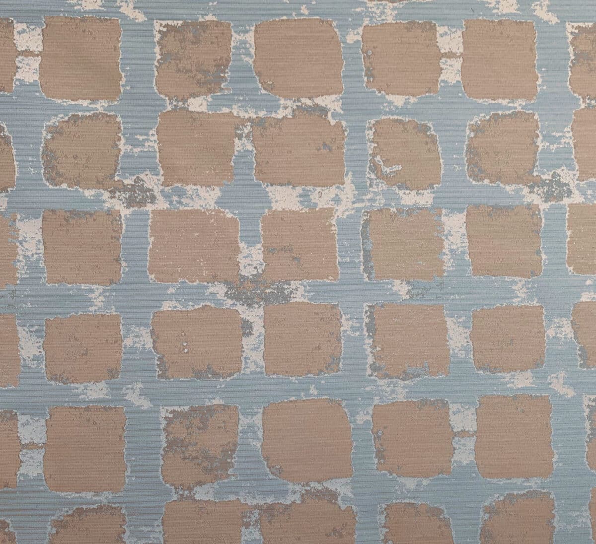 The image shows a textured wallpaper with a pattern of beige rectangles on a light blue background, resembling a brick wall design.