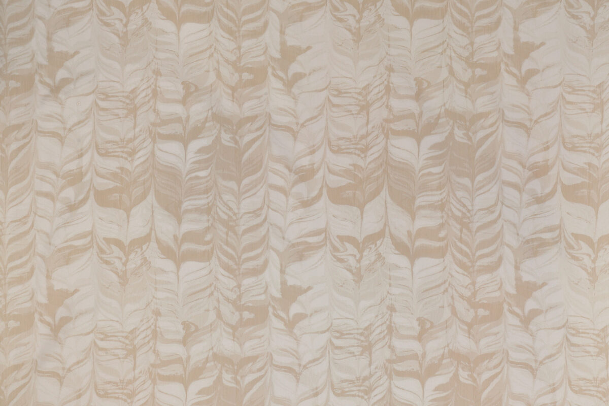 A close-up of beige leaf-patterned wallpaper, featuring an intricate, symmetrical design with subtle variations in texture and hue.